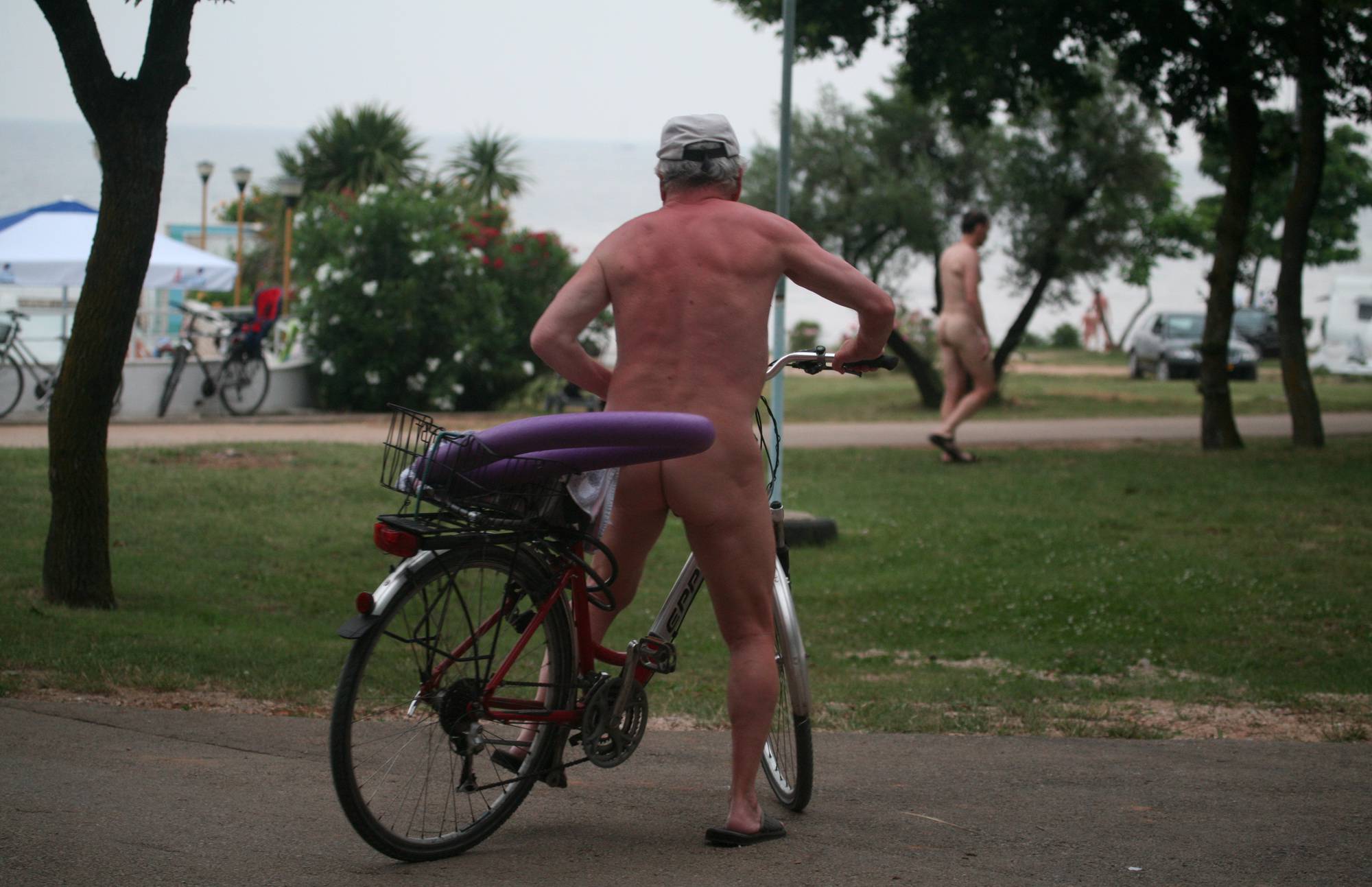 Naturist Poolside Biking - 2