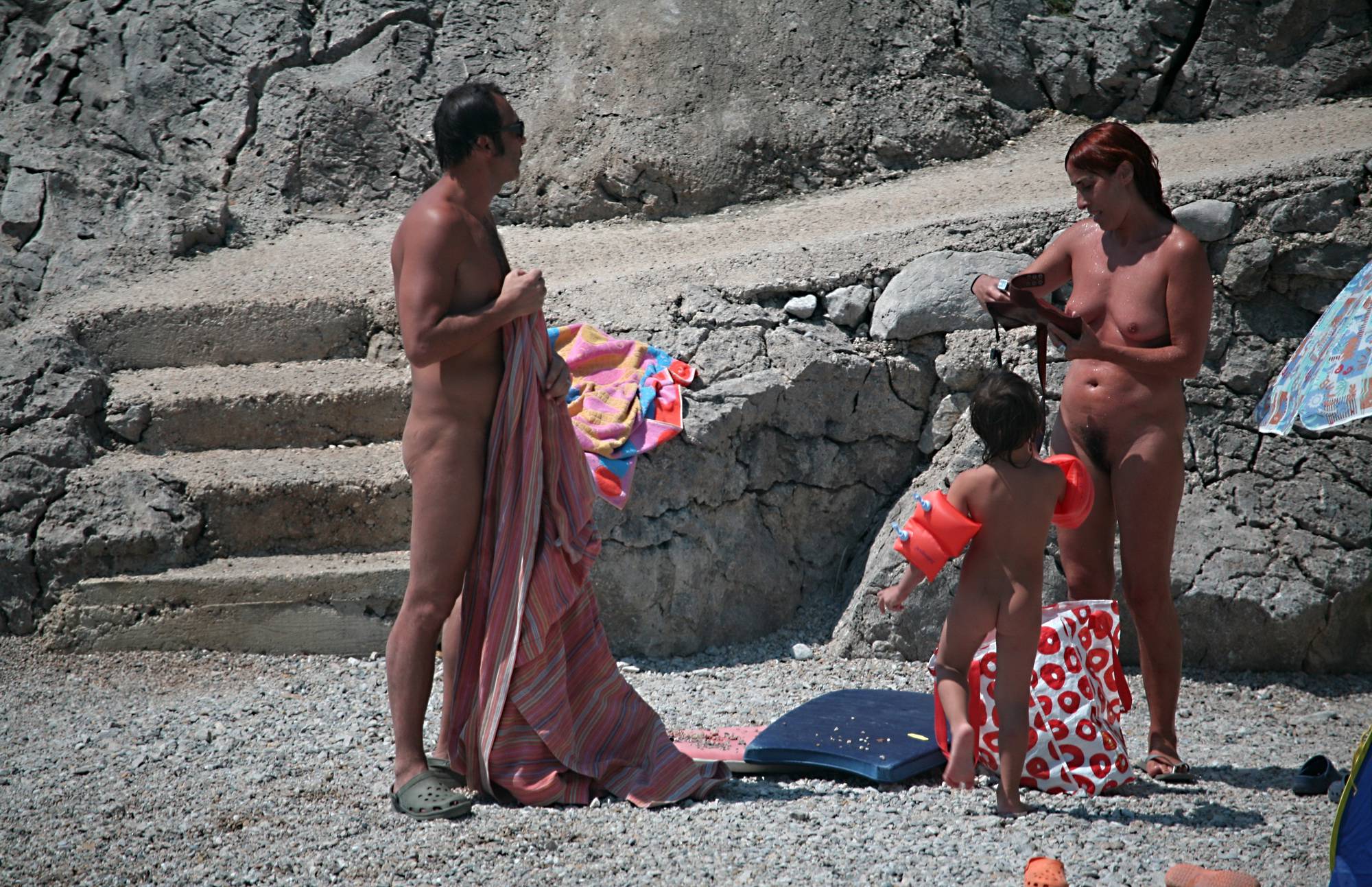 Naturist Family Packing Up - 3