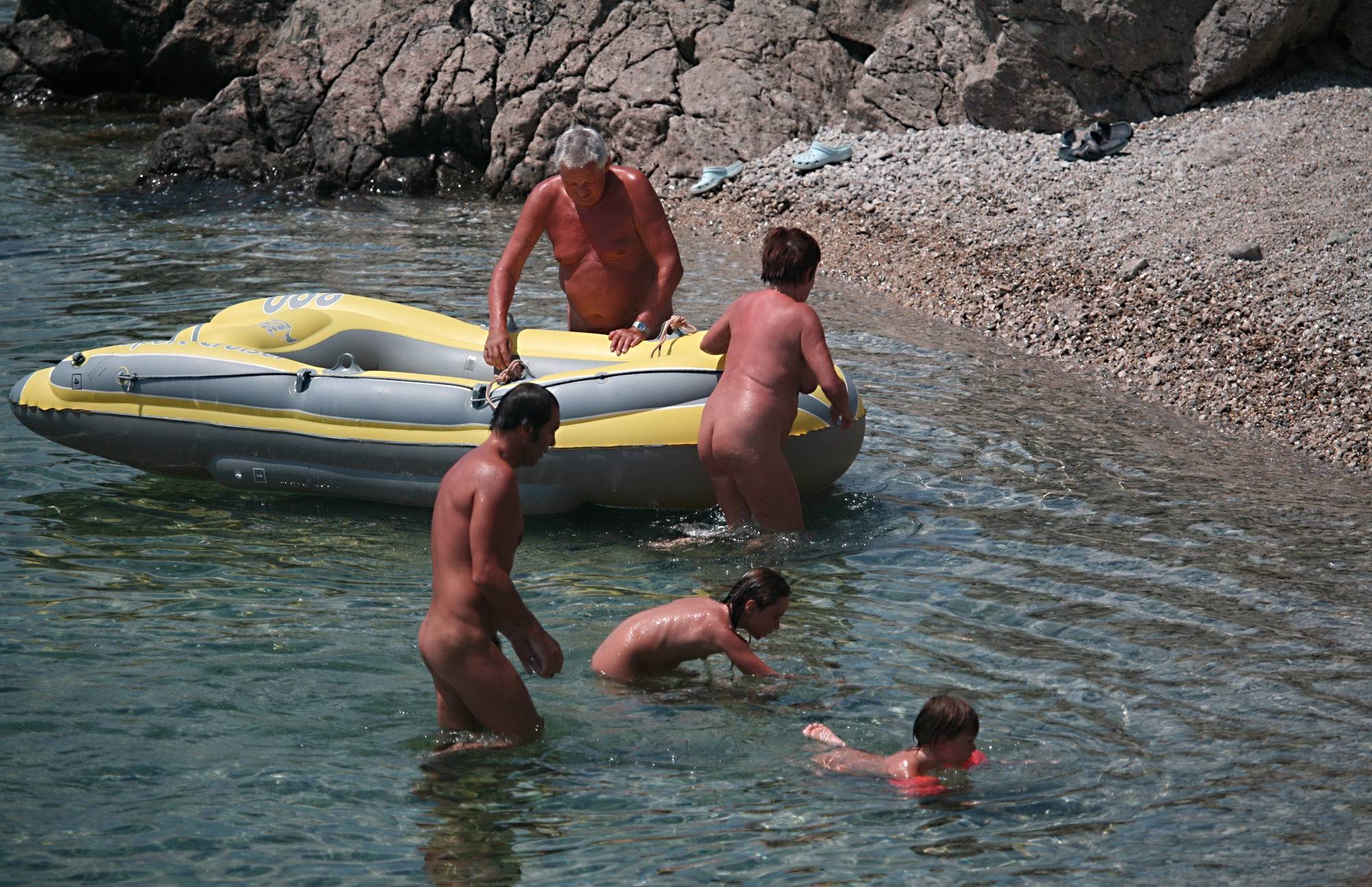 Purenudism Lone Nudist in Yellow Boat - 3