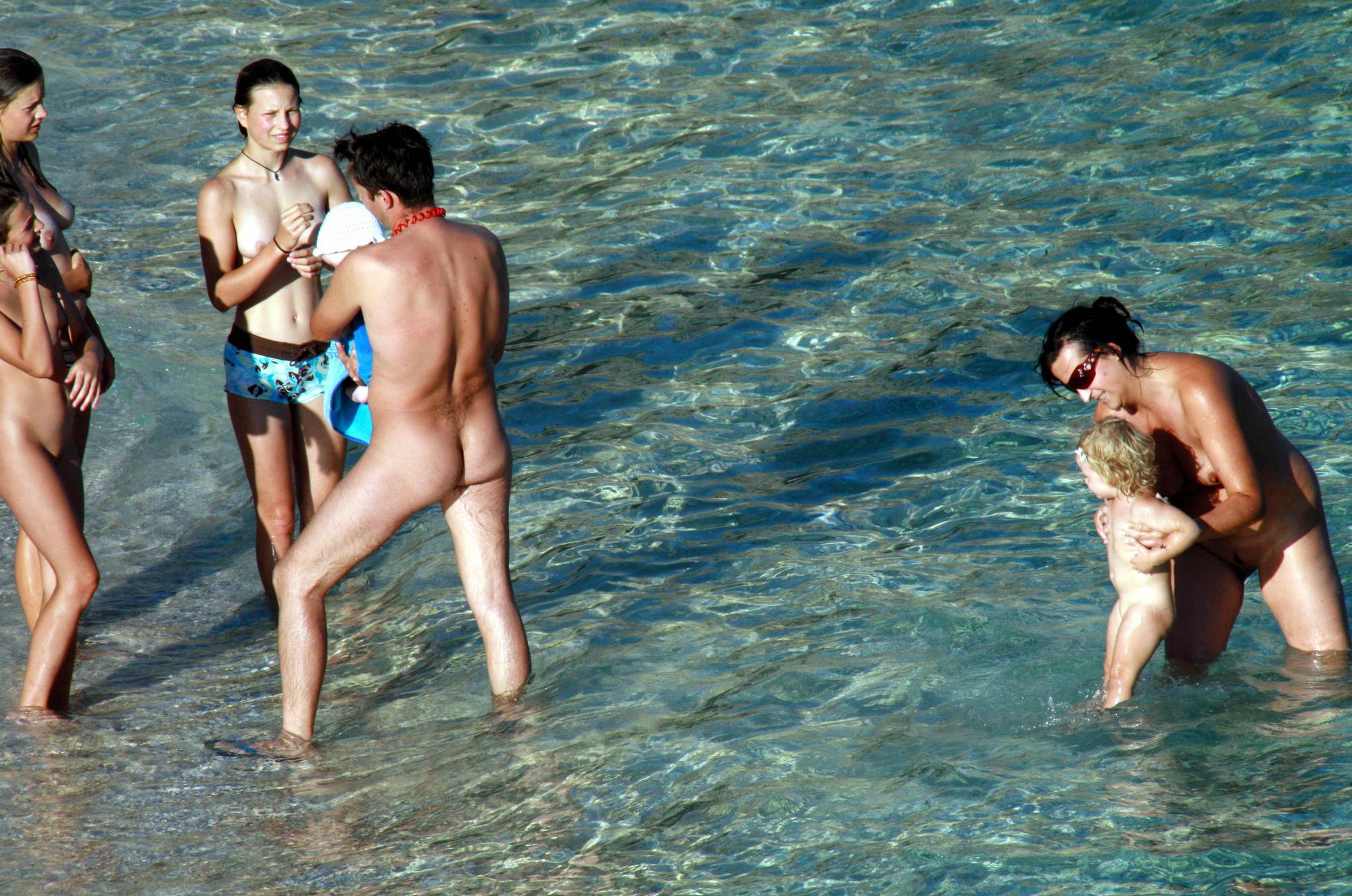 Pure Nudism Family Evening Near Water - 1