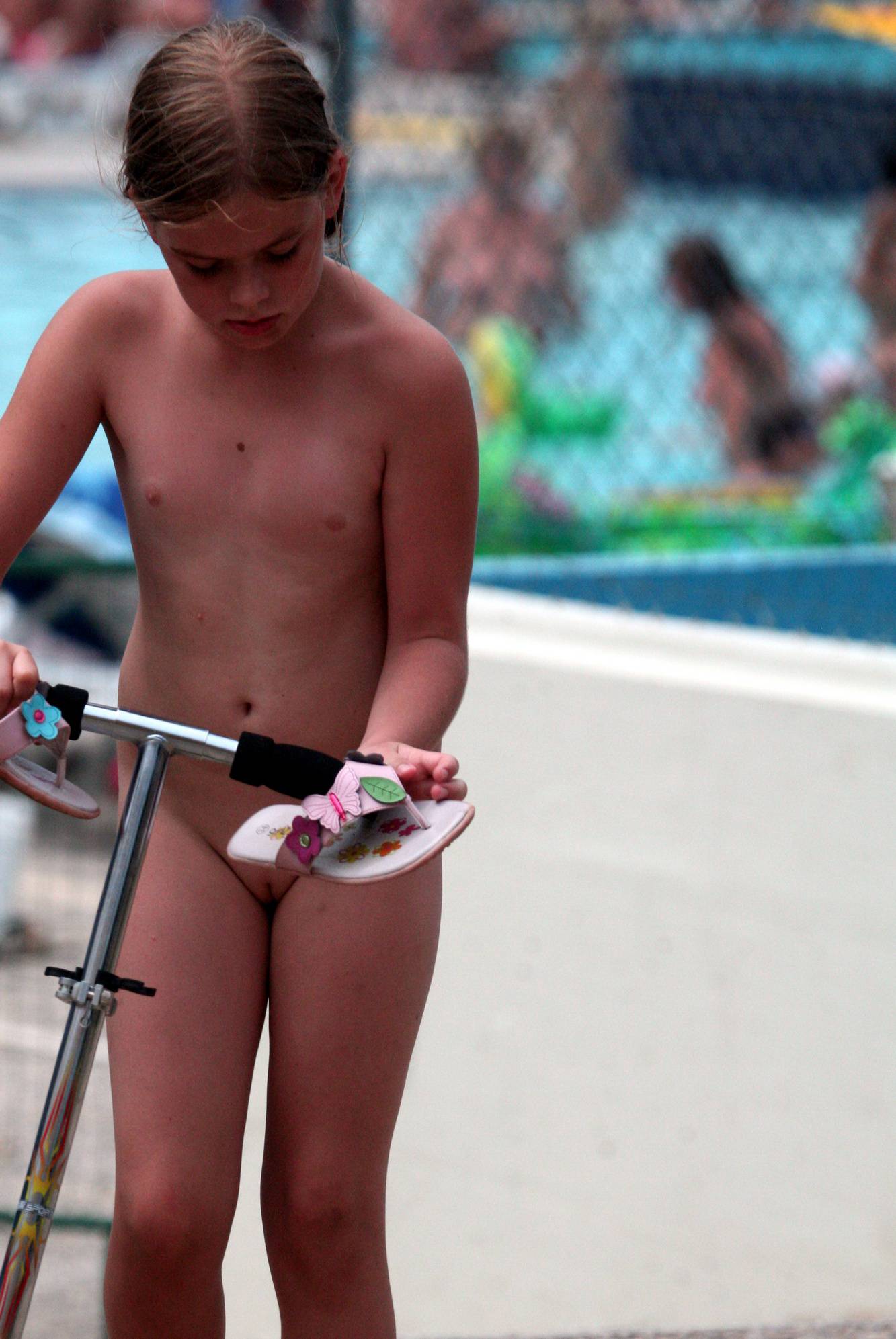 Pool-Side Naturist Scooter - 1
